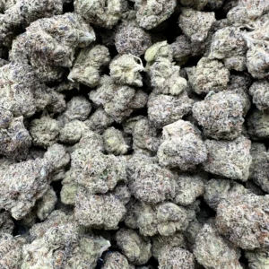 Cold Heat Greenleaf flower buds with dense frosted trichome coverage, pale gray-green coloring, and compact nugget structure